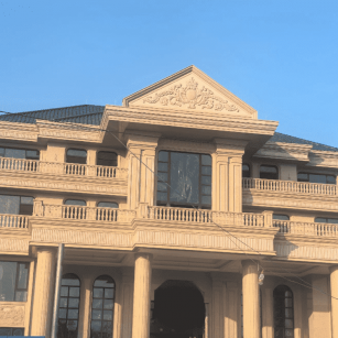 汕尾黄金麻别墅外墙干挂石材效果示例