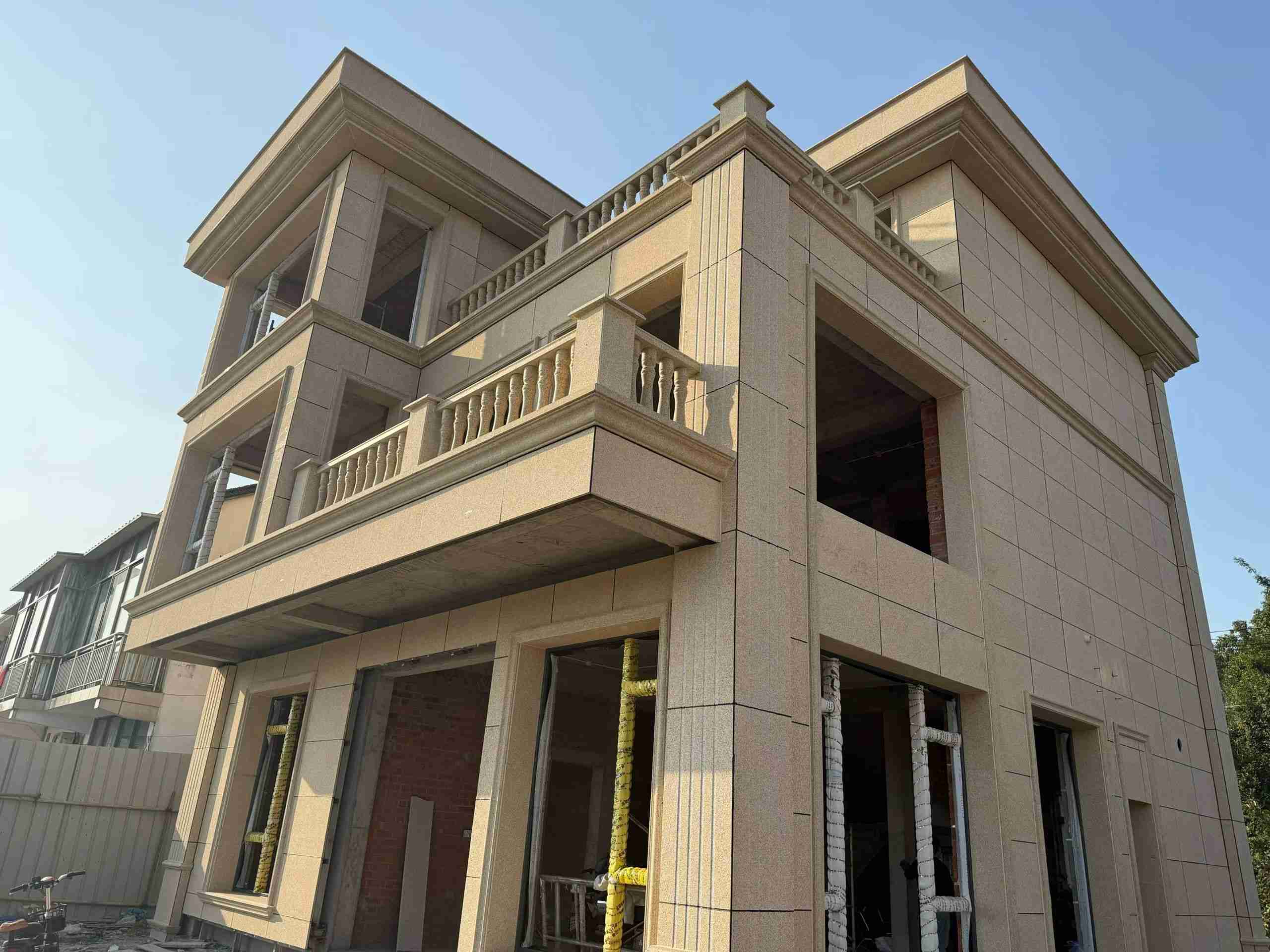 汕尾 黄金麻花岗岩石材荔枝面外墙干挂效果展示